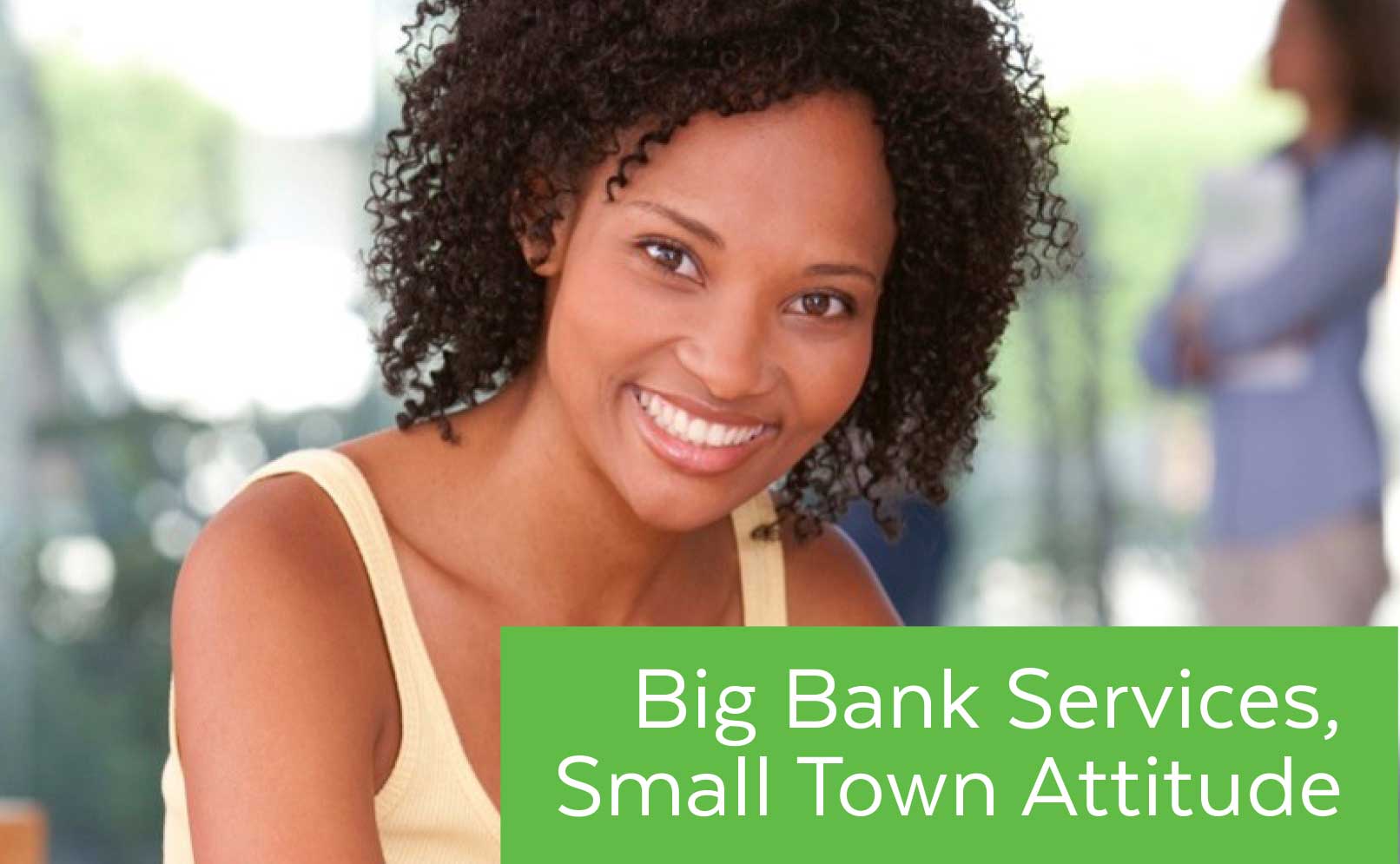 Smiling person with "Big Bank Services, Small Town Attitude" hover text